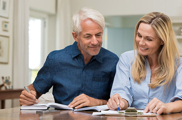 couple evaluating BOK's advice on the five common challenges retirement investors face.